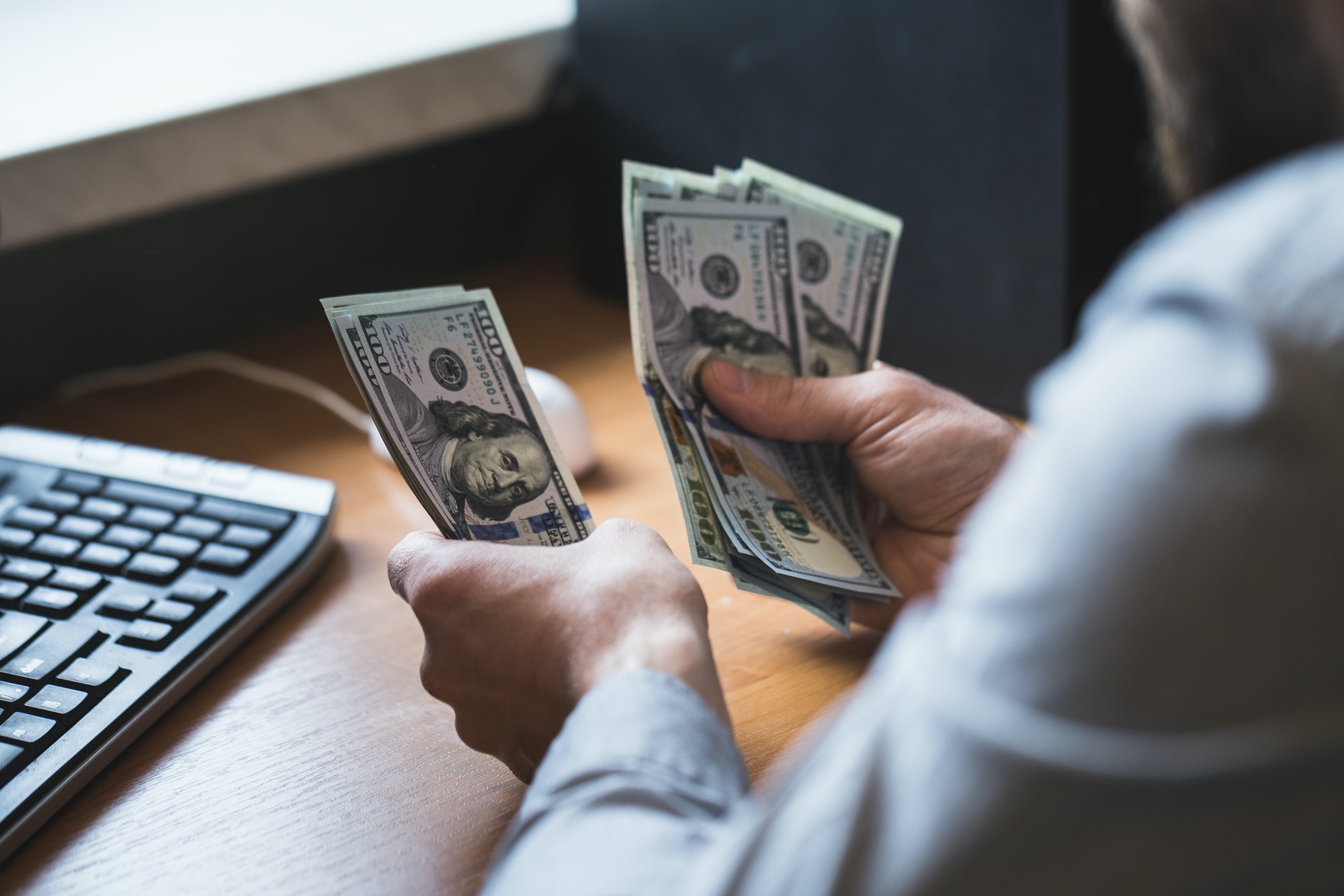 businessman-is-counting-dollars-banknotes-business-and-financial-background.jpg businessman-is-counting-dollars-banknotes-business-and-financial-background.jpg